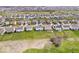 Expansive aerial view of a neighborhood with well-maintained homes and green spaces, creating a serene residential atmosphere at 4922 Birmingham Dr, Indianapolis, IN 46235