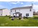 Expansive backyard with lush lawn, featuring a gazebo, perfect for outdoor gatherings and relaxation at 4922 Birmingham Dr, Indianapolis, IN 46235