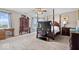 Spacious bedroom with a four-poster bed, decorative curtains, and ample closet space at 4922 Birmingham Dr, Indianapolis, IN 46235