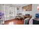 Bright home office space with wood floors, a large window, and classic decor at 4922 Birmingham Dr, Indianapolis, IN 46235