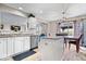 Open kitchen with granite countertops, stainless steel appliances, and an island with seating at 4922 Birmingham Dr, Indianapolis, IN 46235