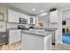 Bright kitchen with stainless steel appliances, granite countertops, and an island at 4922 Birmingham Dr, Indianapolis, IN 46235