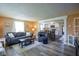 Cozy living room featuring hardwood floors, neutral paint, and lots of natural light at 502 N Maple St, Ingalls, IN 46048