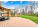 Expansive backyard features a large deck, shed, and a unique cat enclosure for outdoor enjoyment at 5126 Shadow Pointe Dr, Indianapolis, IN 46254