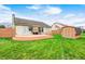 Backyard featuring a spacious deck, a storage shed, and a well-maintained lawn at 5126 Shadow Pointe Dr, Indianapolis, IN 46254
