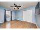 Bedroom with hardwood floors, a window and a ceiling fan at 5126 Shadow Pointe Dr, Indianapolis, IN 46254