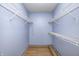 Walk-in closet with shelving and hardwood floors at 5126 Shadow Pointe Dr, Indianapolis, IN 46254