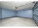 Spacious garage with ample room for parking and storage, featuring an automatic door opener at 5126 Shadow Pointe Dr, Indianapolis, IN 46254