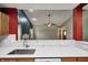 Bright kitchen featuring white counters and stylish backsplash seen from breakfast bar sink at 5126 Shadow Pointe Dr, Indianapolis, IN 46254