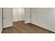 Spacious empty room featuring wood flooring, perfect as a home office at 5309 Spyglass Dr, Whitestown, IN 46075