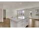 Spacious kitchen featuring an island with seating, perfect for casual dining and entertaining at 5309 Spyglass Dr, Whitestown, IN 46075