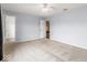 Bright bedroom featuring neutral carpet, walk-in closet, and ample natural light, creating a serene atmosphere at 5817 Thompson Park Blvd, Indianapolis, IN 46237