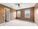 Bedroom with carpet, natural light, and ceiling fan making it a cozy and inviting space at 5817 Thompson Park Blvd, Indianapolis, IN 46237