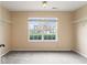 Carpeted bedroom with a large window and closet space, providing ample storage at 5817 Thompson Park Blvd, Indianapolis, IN 46237