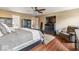 Cozy main bedroom with stylish decor, hardwood floors, and plenty of closet space at 5817 Thompson Park Blvd, Indianapolis, IN 46237