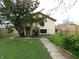 Large backyard with lawn and small garden at 59 N Ridgeview Dr, Indianapolis, IN 46219