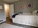 Bedroom with twin bed, neutral walls, and hard wood floors at 59 N Ridgeview Dr, Indianapolis, IN 46219