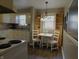 Kitchen with dining table and chairs at 59 N Ridgeview Dr, Indianapolis, IN 46219