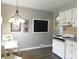 Kitchen features neutral walls, and white cabinetry at 59 N Ridgeview Dr, Indianapolis, IN 46219