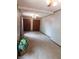 Spacious living room featuring neutral gray walls, carpeted flooring, and natural lighting at 59 N Ridgeview Dr, Indianapolis, IN 46219