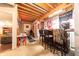 Finished basement area with a bar, dartboard, and sports memorabilia at 6081 Boulder Ct, Columbus, IN 47201