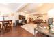 Cozy basement living area featuring a plush sectional sofa, large TV, and modern rug at 6081 Boulder Ct, Columbus, IN 47201