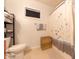 Cozy bathroom featuring neutral colors, a shower, and a decorative wicker basket at 6081 Boulder Ct, Columbus, IN 47201