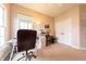 Functional home office with desk space, natural light, and ample storage for a productive work area at 6081 Boulder Ct, Columbus, IN 47201
