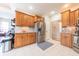 Well-lit kitchen features stainless steel appliances, custom cabinetry, and modern countertops at 6081 Boulder Ct, Columbus, IN 47201