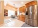 Bright kitchen and breakfast nook with stainless steel fridge and natural light at 6081 Boulder Ct, Columbus, IN 47201