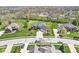 Beautiful aerial view of a home featuring a well-maintained lawn and a long driveway at 621 Foxboro Dr, Avon, IN 46123