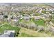 Expansive aerial view of a residential neighborhood featuring well-maintained homes and lush green spaces in the countryside at 621 Foxboro Dr, Avon, IN 46123