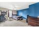 Teen bedroom featuring sporty design with furniture, TV and personal touches at 621 Foxboro Dr, Avon, IN 46123
