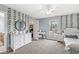 Bedroom features ivy accents, white furniture, and neutral carpeting at 621 Foxboro Dr, Avon, IN 46123