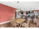 View of the kitchen from the dining room, wooden table with 6 chairs at 621 Foxboro Dr, Avon, IN 46123