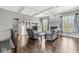 Inviting living room featuring hardwood floors, a cozy fireplace, and bright windows offering a relaxing space at 621 Foxboro Dr, Avon, IN 46123