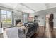 Cozy living room featuring a fireplace, coffered ceiling, and comfortable seating at 621 Foxboro Dr, Avon, IN 46123