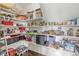 Well-organized pantry with shelving units provides ample storage space at 621 Foxboro Dr, Avon, IN 46123