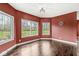 Sunlit room with large windows offering views of the landscaped yard at 621 Foxboro Dr, Avon, IN 46123
