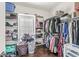 Well-organized walk-in closet with custom shelving and clothing racks at 621 Foxboro Dr, Avon, IN 46123
