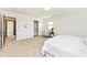 Serene bedroom featuring a comfortable bed, closet, and soft carpet at 6454 Dean Rd, Indianapolis, IN 46220