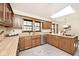 Bright kitchen with oak cabinets, stainless steel appliances, and lots of natural light at 6454 Dean Rd, Indianapolis, IN 46220