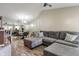 Spacious living room features plush seating, a neutral color scheme, and stylish flooring at 6516 Emerald Hill Ct # 310, Indianapolis, IN 46237