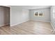 Bright bedroom features modern floors, neutral walls and natural light from two windows at 652 E Tilden Dr, Brownsburg, IN 46112