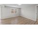 Cozy bedroom with light walls, hardwood floors and natural light at 652 E Tilden Dr, Brownsburg, IN 46112