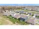 An aerial view of a well-planned community with green spaces and modern homes at 6622 Cardiff Cir, McCordsville, IN 46055