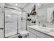 Bright, clean bathroom with glass shower, quartz countertop and modern fixtures creating a spa-like retreat at 6622 Cardiff Cir, McCordsville, IN 46055