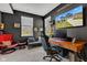 Bedroom featuring comfortable seating, natural light, and a modern desk setup for a relaxing and productive space at 6622 Cardiff Cir, McCordsville, IN 46055