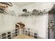 Organized walk-in closet with shelving for clothing and shoes at 7048 Tassel Meadow Dr, Indianapolis, IN 46217