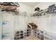 Walk-in closet with shelving and storage organizers for clothes and shoes at 7048 Tassel Meadow Dr, Indianapolis, IN 46217